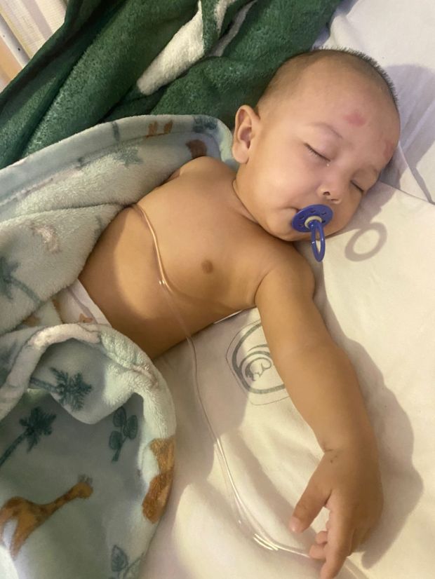 Life-saving medical assistance for a baby. (Sue Fasino)