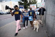 American Federation of Government Employees, AFGE, members and their supporters march around...