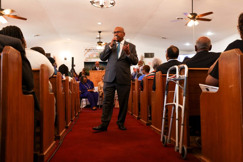The Rev. Bruce Fortner speaks to the congregation during the New Mount Moriah Missionary...