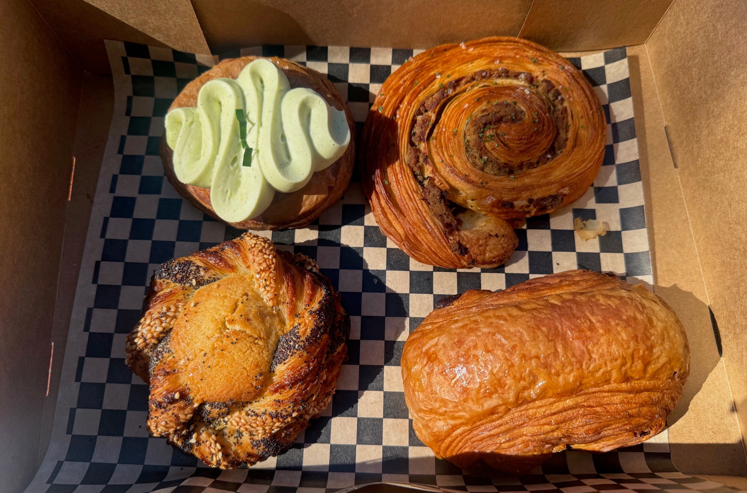 Box of pastries in a soft sunlight.