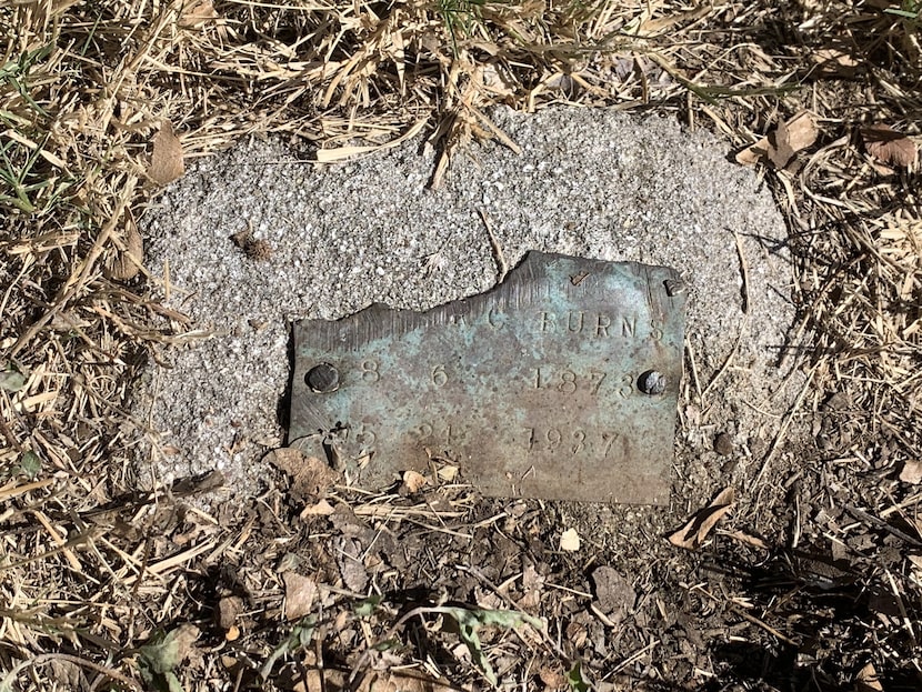 All that remains of the marker for Homer Milton C. Burns in the Dallas City Cemetery