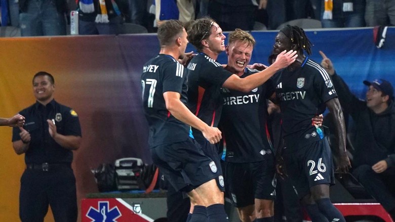 SDFC players celebrate goal by Onni Valakari (second from left) in the first match of playoffs. (Photo by Chris Stone/Times of San Diego.com)