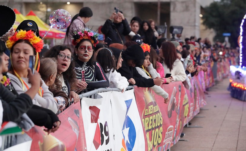 The public watches the Dia de los Muertos Parade in downtown Dallas on Saturday, October 28,...