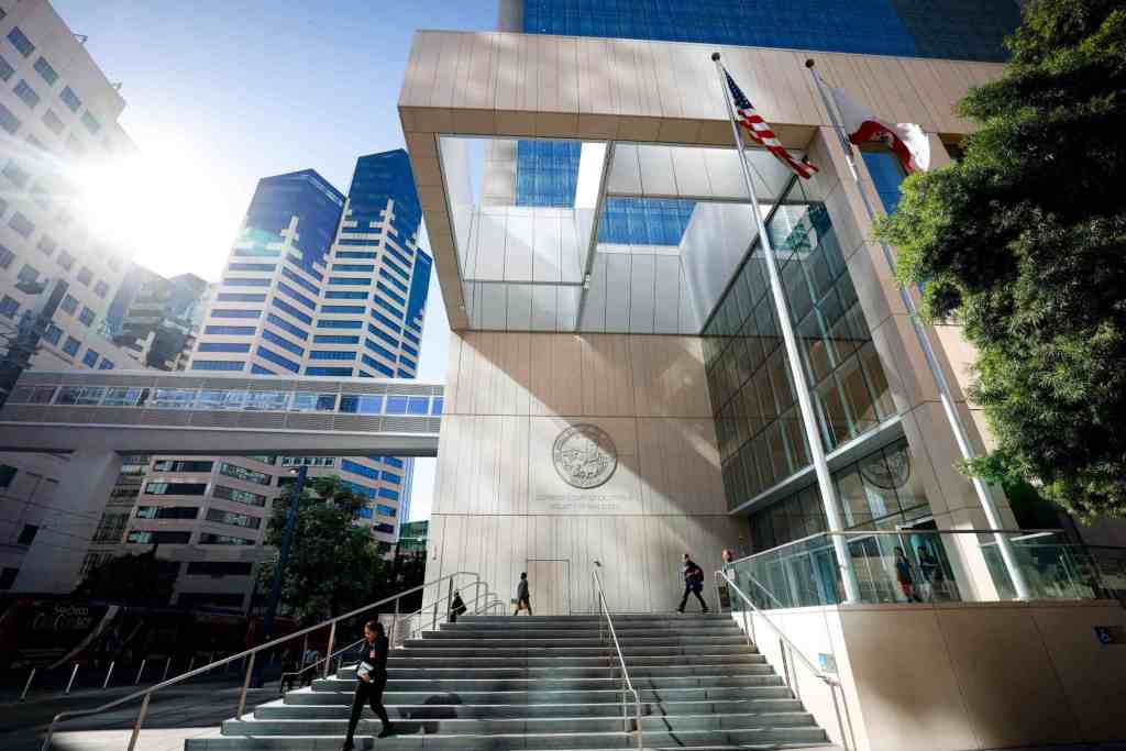 San Diego deputy on trial, accused of injuring restrained man