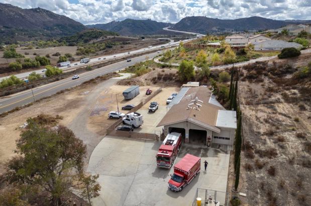 North County Fire Protection District's Station 4 that's to be replaced. Above is Interstate 15, where many emergencies occur that the station responds to. (Charlie Neuman / For The San Diego Union-Tribune)
