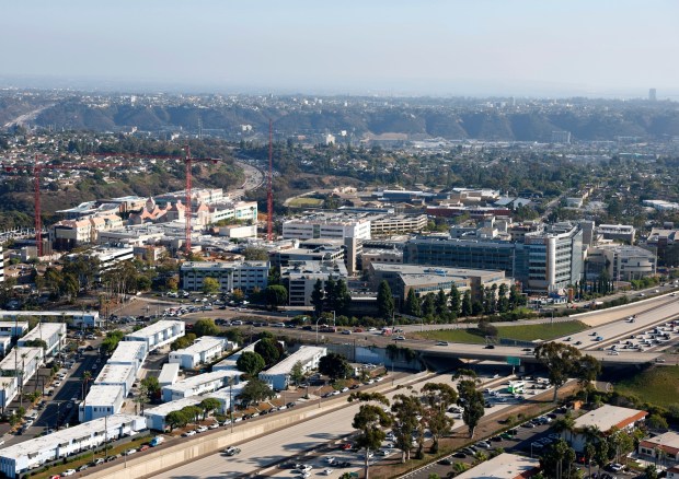 In an aerial photo, Sharp Memorial Hospital and Rady Children's Hospital are seen along SR-163 on Oct. 7, 2025 in San Diego, CA. (K.C. Alfred / The San Diego Union-Tribune)
