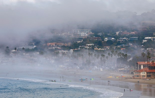 Fog envelopes La Jolla Shores beach on Oct. 21, 2025, in San Diego. (K.C. Alfred / The San Diego Union-Tribune)