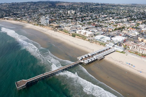In an aerial photo, the Crystal Pier is seen in Pacific Beach on Oct. 7, 2025 in San Diego, CA. (K.C. Alfred / The San Diego Union-Tribune)