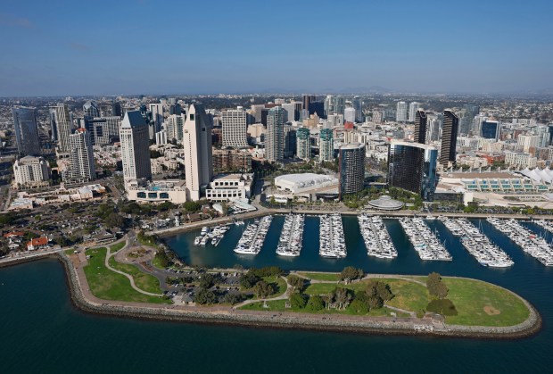 In an aerial photo, Embarcadero Marina Park North, Manchester Grand Hyatt, Marriott Marquis San Diego Marina, San Diego Convention Center and downtown are seen along San Diego Bay on Oct. 7, 2025 in San Diego, CA. (K.C. Alfred / The San Diego Union-Tribune)