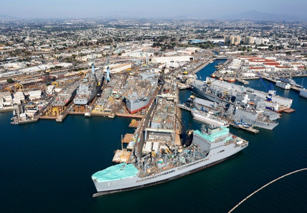 In an aerial photo, U.S. Navy ships are docked at General Dynamics NASSCO on Oct. 7, 2025 in San Diego, CA. (K.C. Alfred / The San Diego Union-Tribune)