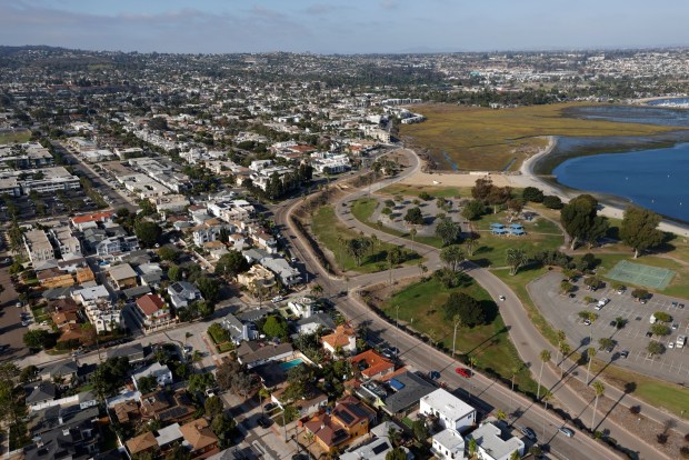 In an aerial photo, Crown Point Park and the Kendall-Frost Mission Bay Marsh Reserve are seen during a low tide in the community of Pacific Beach on Oct. 7, 2025, in San Diego. (K.C. Alfred / The San Diego Union-Tribune)