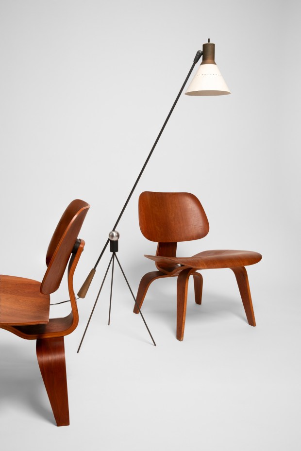 Charles O. Eames and Ray Eames' 1950s-era LCW-Lounge Chairs, made of plywood, from the Mingei International Museum's collection, and a 1951 floor lamp designed by Gilbert A. Watrous, manufactured by Heifetz Co. in New York. (Ron Kerner)