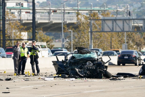 On the eastbound lanes on Int. 8 on Tuesday, investigators continue their investigation on the fatal accident on Interstate 8 that occurred around 10:20pm Monday night. La Mesa police Officer Lauren Craven, 25, came upon the crash and stopped to help the motorists. While she was taking the report of the initial accident, another car driving eastbound on I-8 struck the officer, CHP officials said. (Nelvin C. Cepeda / The San Diego Union-Tribune)