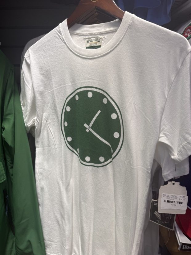 A T-shirt for sale in a Wrigley Field gift shop shows the stadium's iconic clock. (Ryan Finley, U-T)