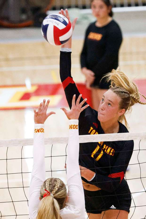 Torrey Pines' Finley Krystkowiak hits against Cathedral Catholic during their game at Cathedral Catholic High School on Thursday, Sept. 12, 2024 in San Diego, CA. (Meg McLaughlin / The San Diego Union-Tribune)
