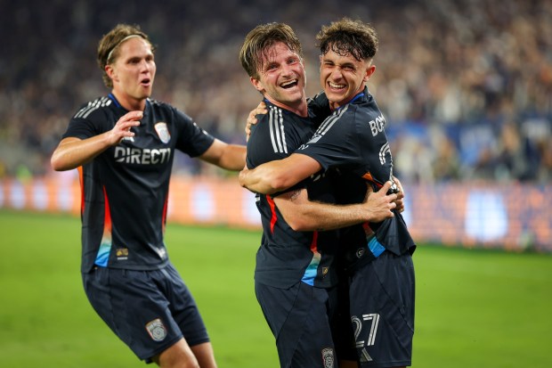 Onni Valakari #8, Anders Dreyer #10 and Luca Bombino #27 of San Diego FC celebrate after Dreyer's goal against the Portland Timbers during match one of the Western Conference Round One of the 2025 MLS Cup Playoffs at Snapdragon Stadium on Sunday, Oct. 26, 2025 in San Diego, California. (Meg McLaughlin / The San Diego Union-Tribune)