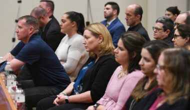 Families of Sandy Hook victims sit in the front row as Infowars founder Alex Jones testifies during the Sandy Hook defamation damages trial at Connecticut Superior Court in Waterbury, Conn. Thursday, Sept. 22, 2022. (Tyler Sizemore/Hearst Connecticut Media via AP, Pool, File)