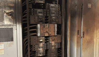A photo of the charred, failed switchgear panel in Building 50