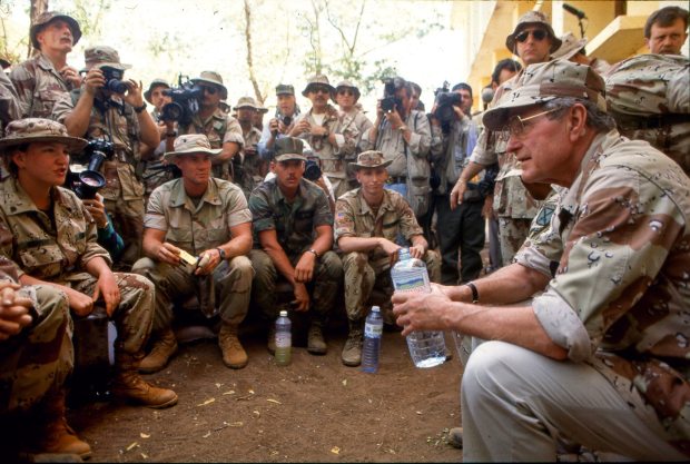 President George H.W. Bush meets with Marines in Somalia in 1993. (Hayne Palmour IV / The San Diego Union-Tribune)