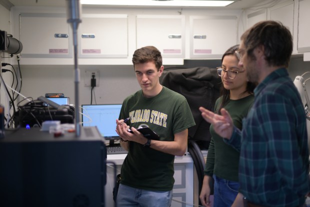 From left, CSU graduate students Jared Stickney, Daniela Guevara and Brandon McGuire monitor air quality sampling equipment in Fort Collins on Aug. 27, 2025. (Photo by Hyoung Chang/The Denver Post)