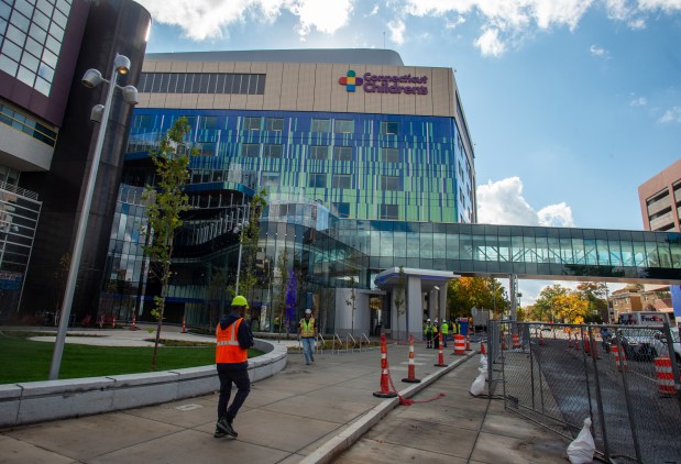 The walkway over Washington Street connects the new parking garage to the Connecticut Children's main entrance on Wednesday, Oct. 22, 2025, as construction continues ahead of the Dec. 4 ribbon cutting. (Aaron Flaum/Hartford Courant)