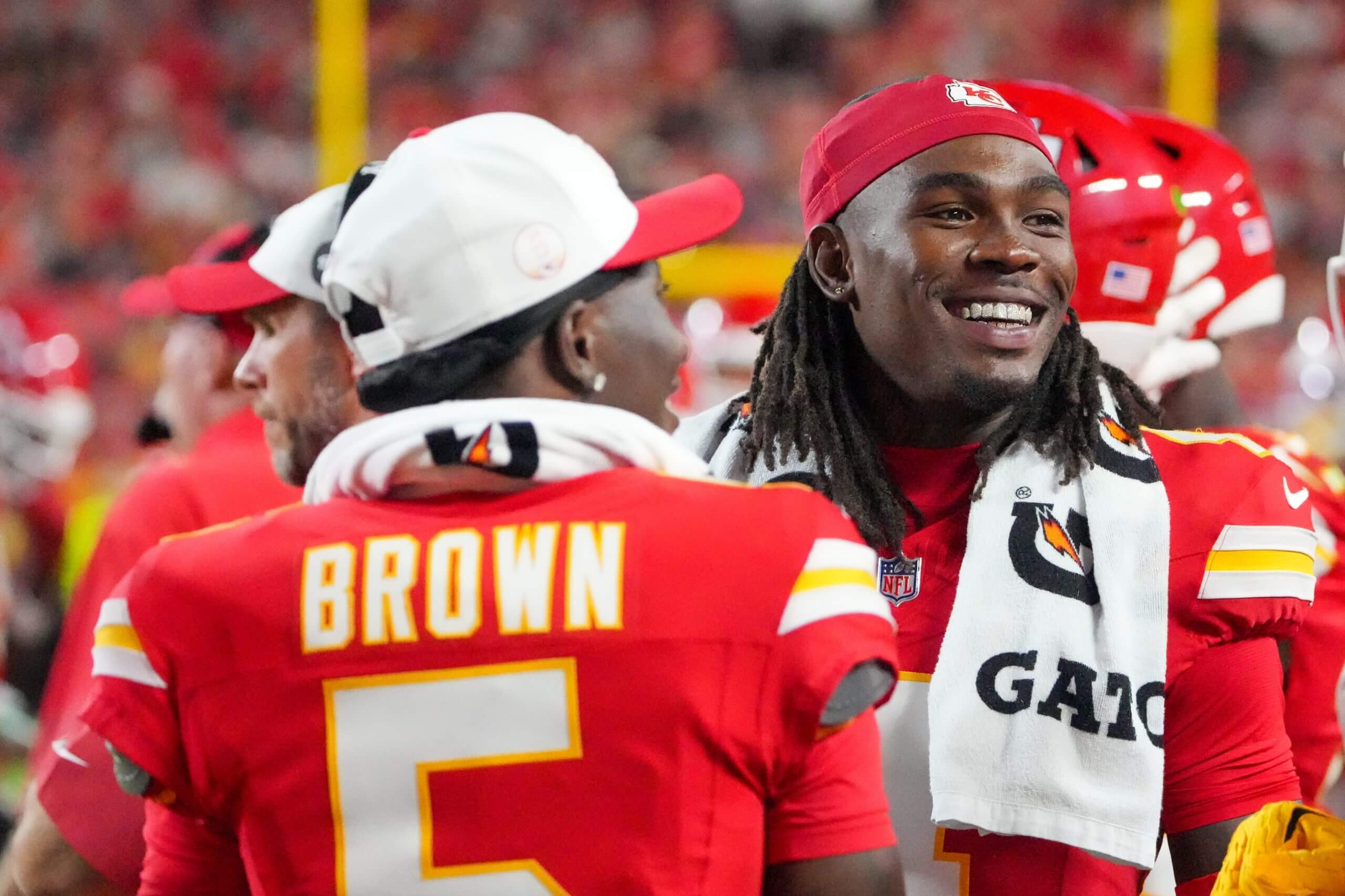Kansas City's Hollywood Brown and Rashee Rice talk during a preseason game. 