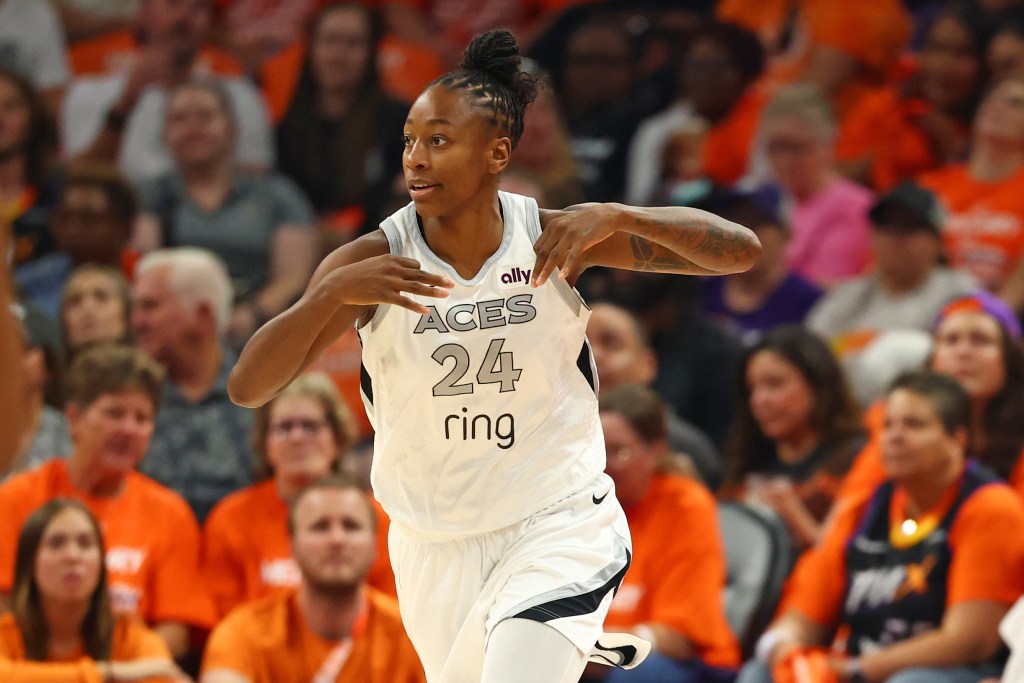 Jewell Loyd celebrates after making a 3-pointer in the first quarter of Game 3 between the Phoenix Mercury and Las Vegas Aces.