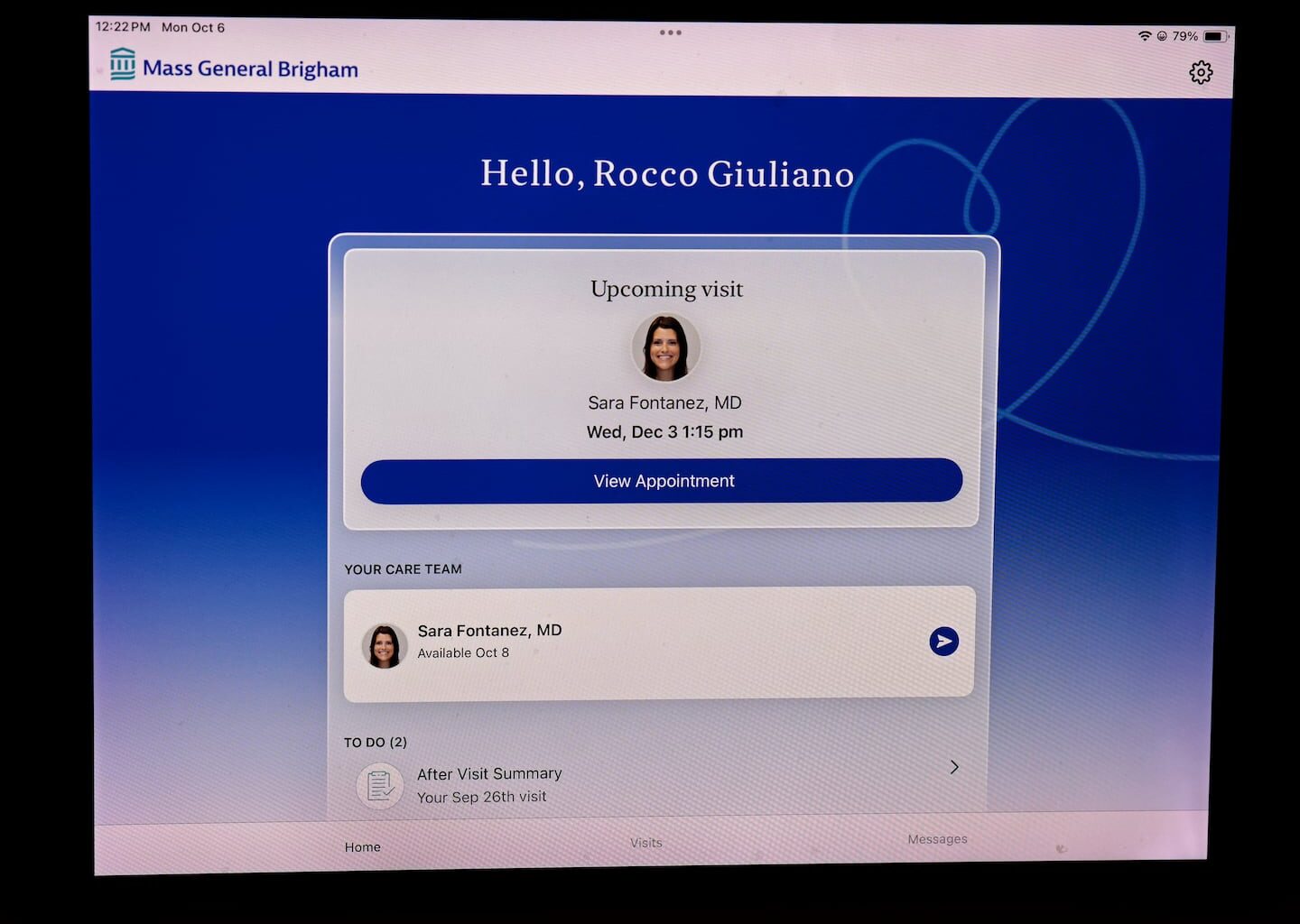 The after-visit summary on Rocco Giuliano’s iPad inside his Boston apartment on Oct. 6. Giuliano, who doesn’t have a primary care physician, recently used an AI platform from Mass General Brigham to be referred to a doctor for a telehealth appointment.