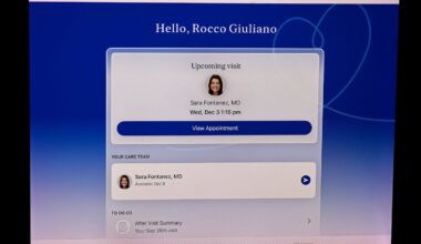 The after-visit summary on Rocco Giuliano’s iPad inside his Boston apartment on Oct. 6. Giuliano, who doesn’t have a primary care physician, recently used an AI platform from Mass General Brigham to be referred to a doctor for a telehealth appointment.