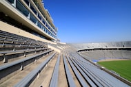 An exterior view of the bench seats and upper luxury suites of the Cotton Bowl at Fair Park...