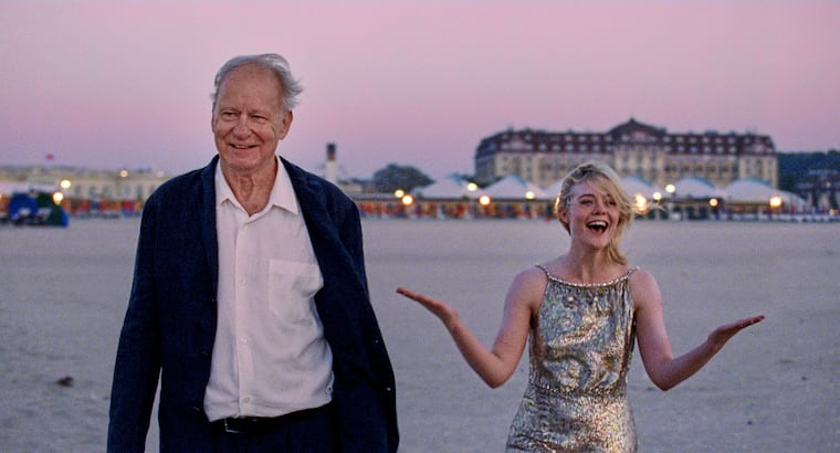 Stellan Skarsgård, left, and Elle Fanning in a scene from "Sentimental Value." (Kasper Tuxen/Neon via AP)