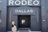 A pedestrian walks by Rodeo Dallas in Deep Ellum in August 2025.
