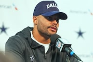 Dallas Cowboys quarterback Dak Prescott (4) responds to questions during a news conference...