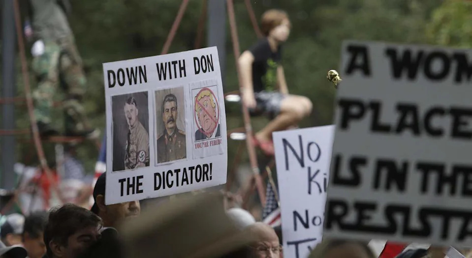 A large crowd gathers in Burk Burnett Park for the No Kings protest in downtown Fort Worth on Saturday, Oct. 18, 2025.