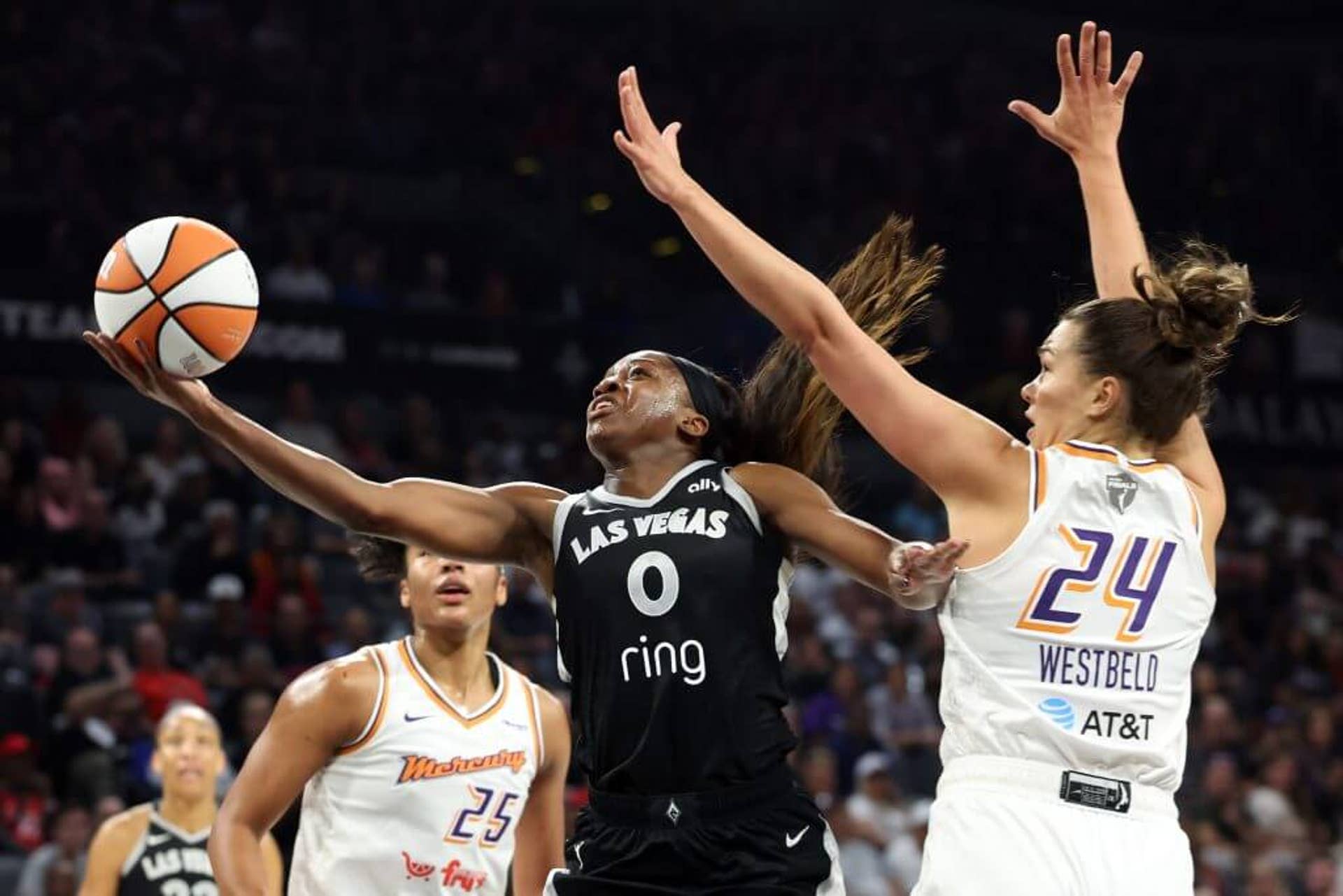 Dana Evans of the Aces drives to the basket during Game 1 of the WNBA Finals.