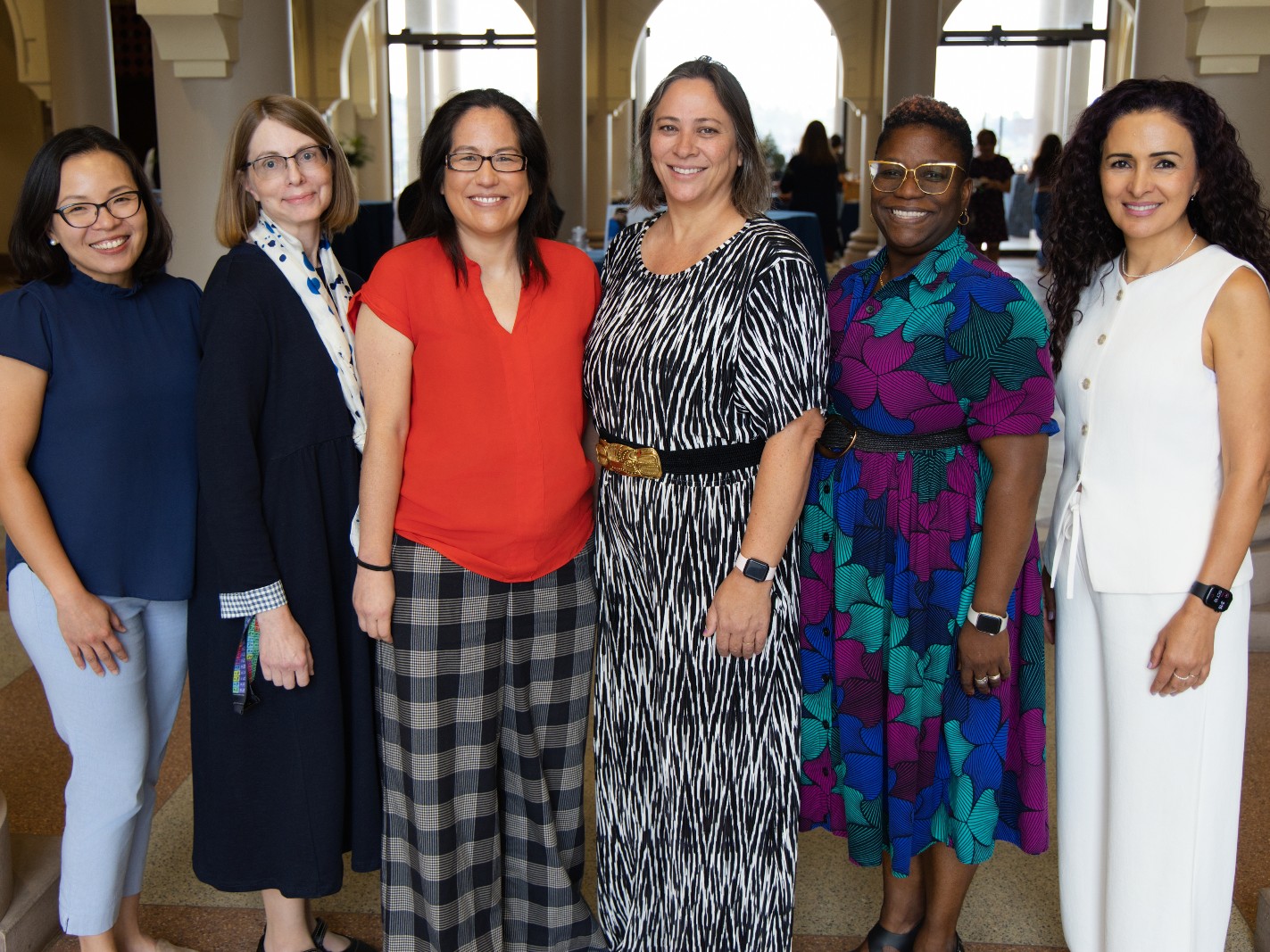 Group shot of Dr. Jessica Bell, Dr. Jennifer Prairie, Dr. Amanda Ruiz, Dr. Joan Schellinger, Dr. Odesma Dalrymple and Dr. Imane Khalil