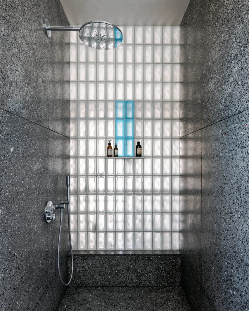 Shower lined with recycled plastic terrazzo