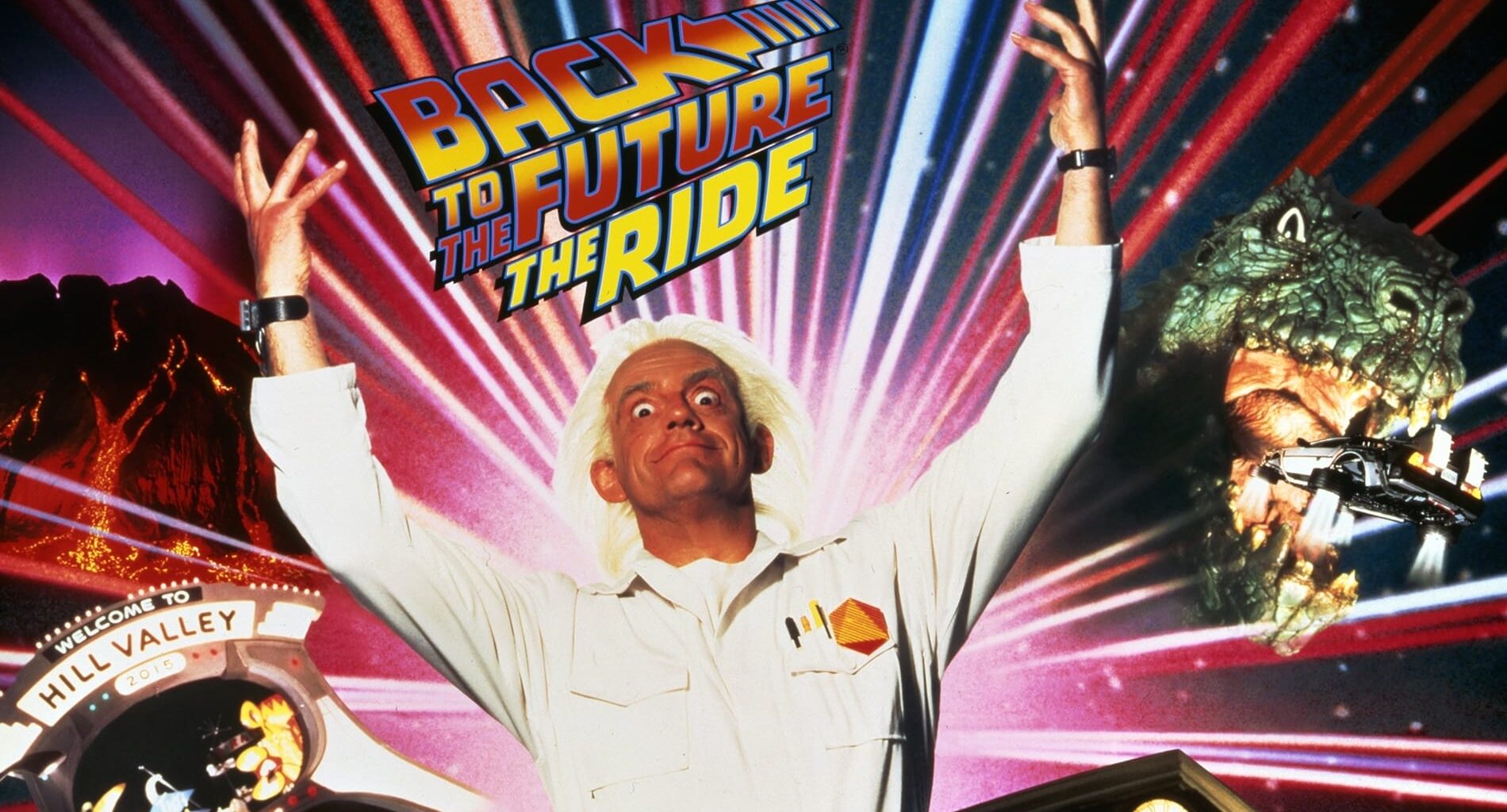 A scientist in a white coat poses with raised arms beneath a "Back to the Future: The Ride" sign, dramatic lights behind him—no Disney castle present, unlike any Disneyland or Walt Disney World castle comparisons.
