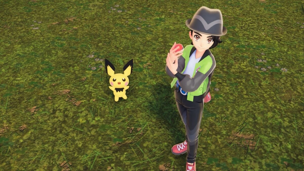 A Z-A trainer holds a Poke Ball next to Pikachu