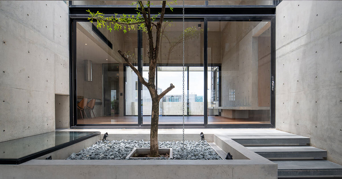 green courtyard anchors hybrid home and office in bangkok