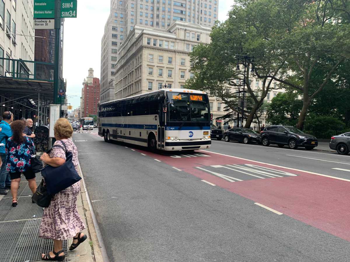 Where the candidates stand on street redesigns, bike and bus lanes, fare evasion and more