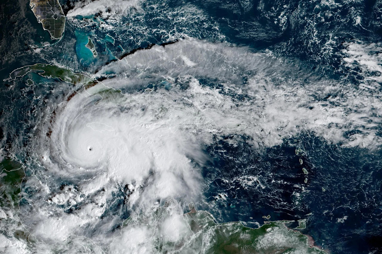 Hurricane Melissa, which has strengthened into a Category 5 storm, moves north in the Caribbean Sea toward Jamaica on Monday in this composite satellite image. (CIRA/NOAA/Handout via Reuters)