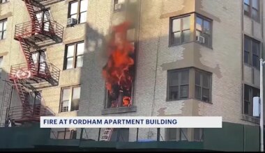 Citizen video shows child rescued from Fordham blaze that left 12 people injured