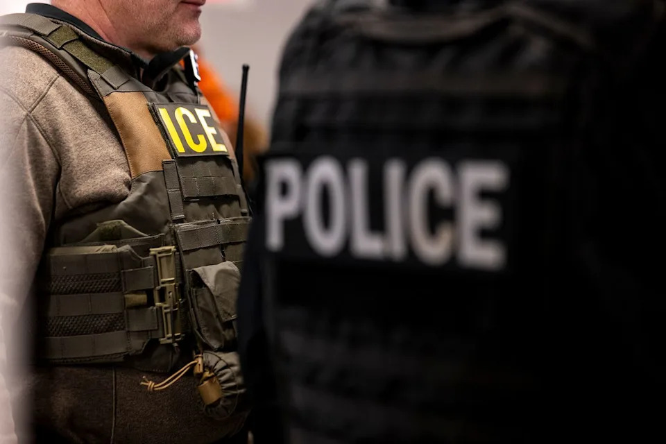 Christopher Dilts/Bloomberg via Getty ICE agents during a pre-enforcement meeting in Chicago on Jan. 26