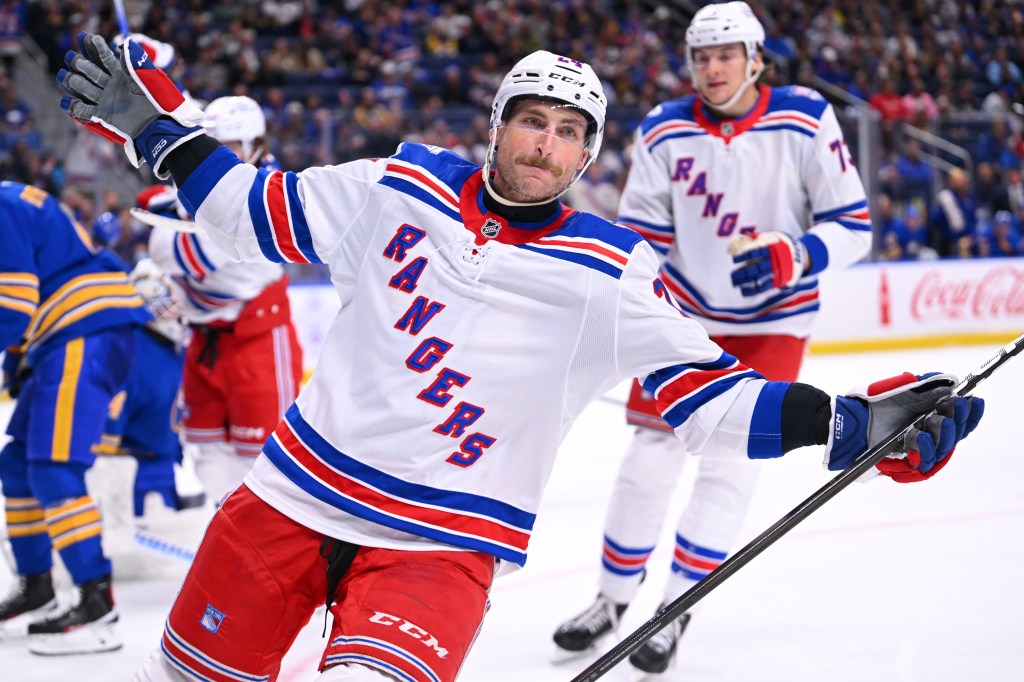 Carson Soucy #24 of the New York Rangers celebrates after scoring a goal during the third period of an NHL game against the Buffalo Sabres at KeyBank Center on October 9, 2025 in Buffalo, New York.