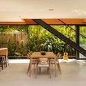 Pupunha House / Laurent Troost Architectures + Hana Eto Gall Paisagismo - Interior Photography, Dining room, Wood, Table, Chair