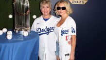 LOS ANGELES, CA - OCTOBER 28:  Christy Martin and Sydney Sweeney pose for a photo prior to Game Four of the 2025 World Series presented by Capital One between the Toronto Blue Jays and the Los Angeles Dodgers at Dodger Stadium on Tuesday, October 28, 2025 in Los Angeles, California. (Photo by Joe Scarnici/MLB Photos via Getty Images)