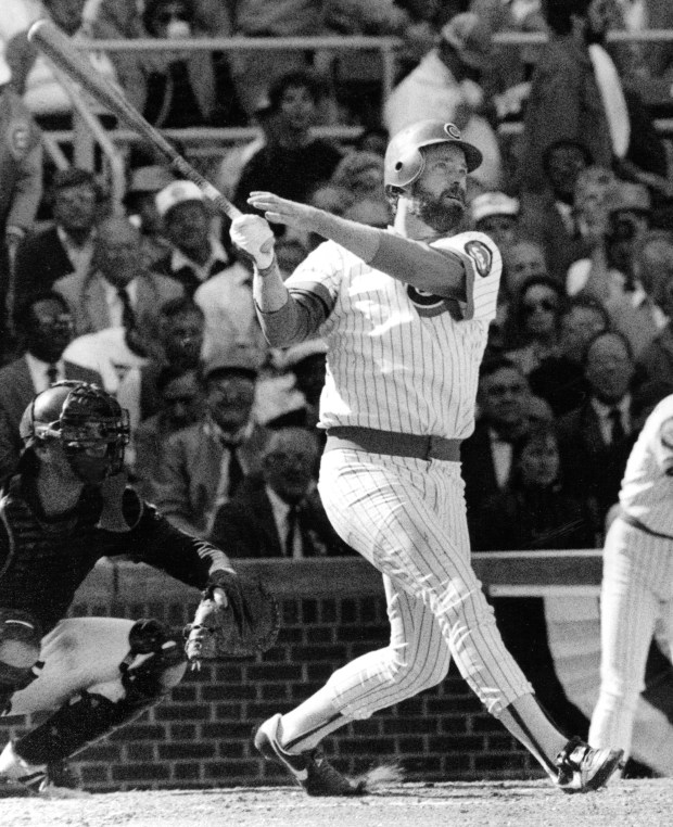Cub pitcher Rick Sutcliffe watches his third-inning home run sail over the right-field fence in the Cubs' 13-0 pasting of the San Diego Padres on Oct. 2, 1984, at Wrigley Field in Chicago. The Cubs hit five homers in the game, breaking a League Championship Series record. (Jerry Tomaselli/Chicago Tribune)