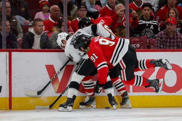 Chicago Blackhawks center Frank Nazar (91) falls on the ice while trying to get the puck during the first period against the Los Angeles Kings at the United Center Sunday Oct. 26, 2025 in Chicago. (Armando L. Sanchez/Chicago Tribune)