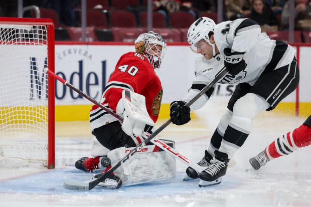 Chicago Blackhawks goaltender Arvid Soderblom (40) blocks a shot from Los Angeles Kings right wing Alex Laferriere (14) during the second period at the United Center Sunday Oct. 26, 2025 in Chicago. (Armando L. Sanchez/Chicago Tribune)